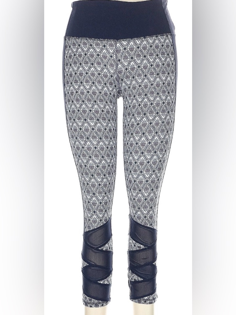 Fun And Attractive Athleta Blue And White Patterned Leggings With Mesh Detail.